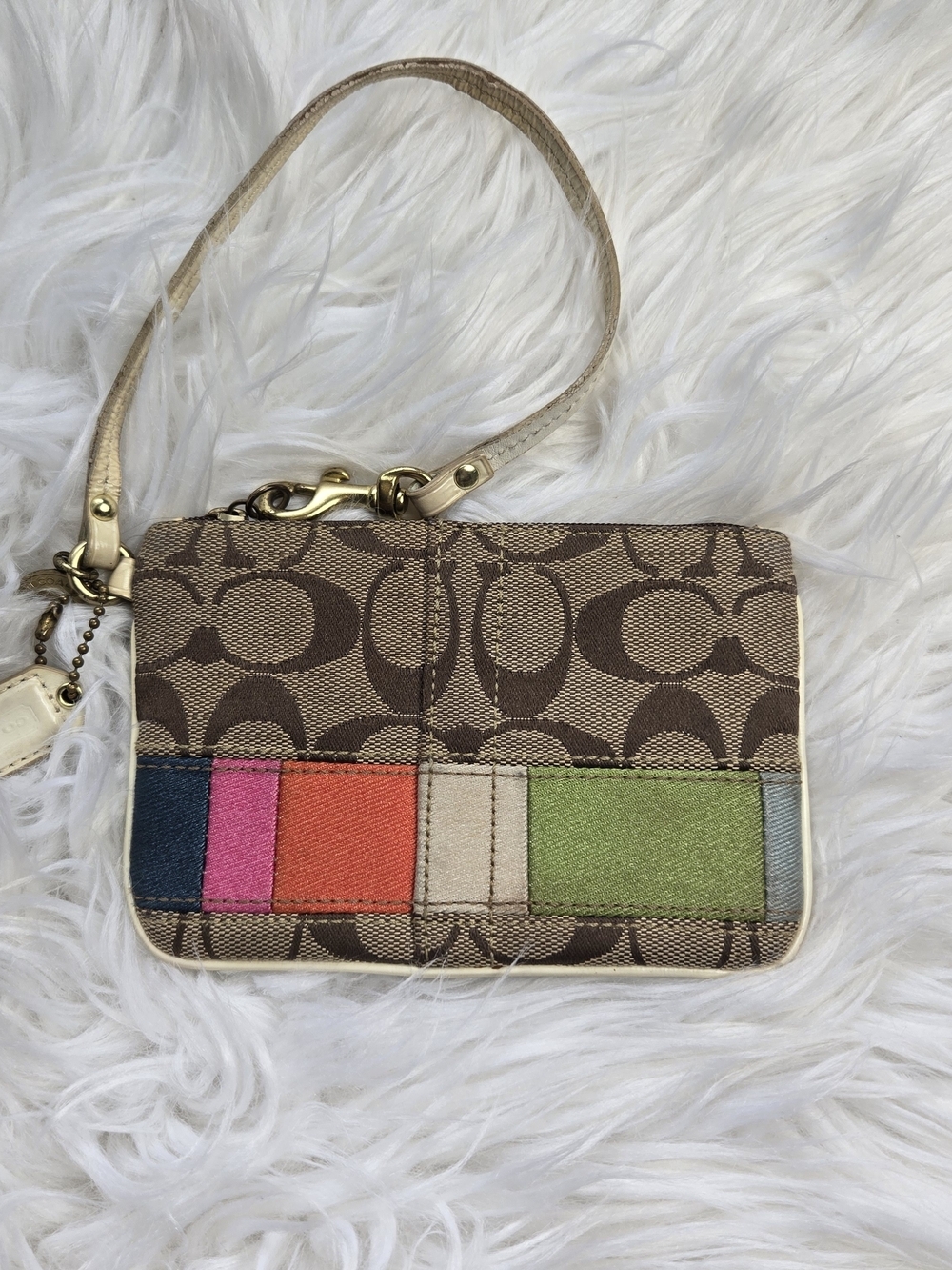 Coach Brown Signature Canvas Wristlet with Multicolor Stripe Panel